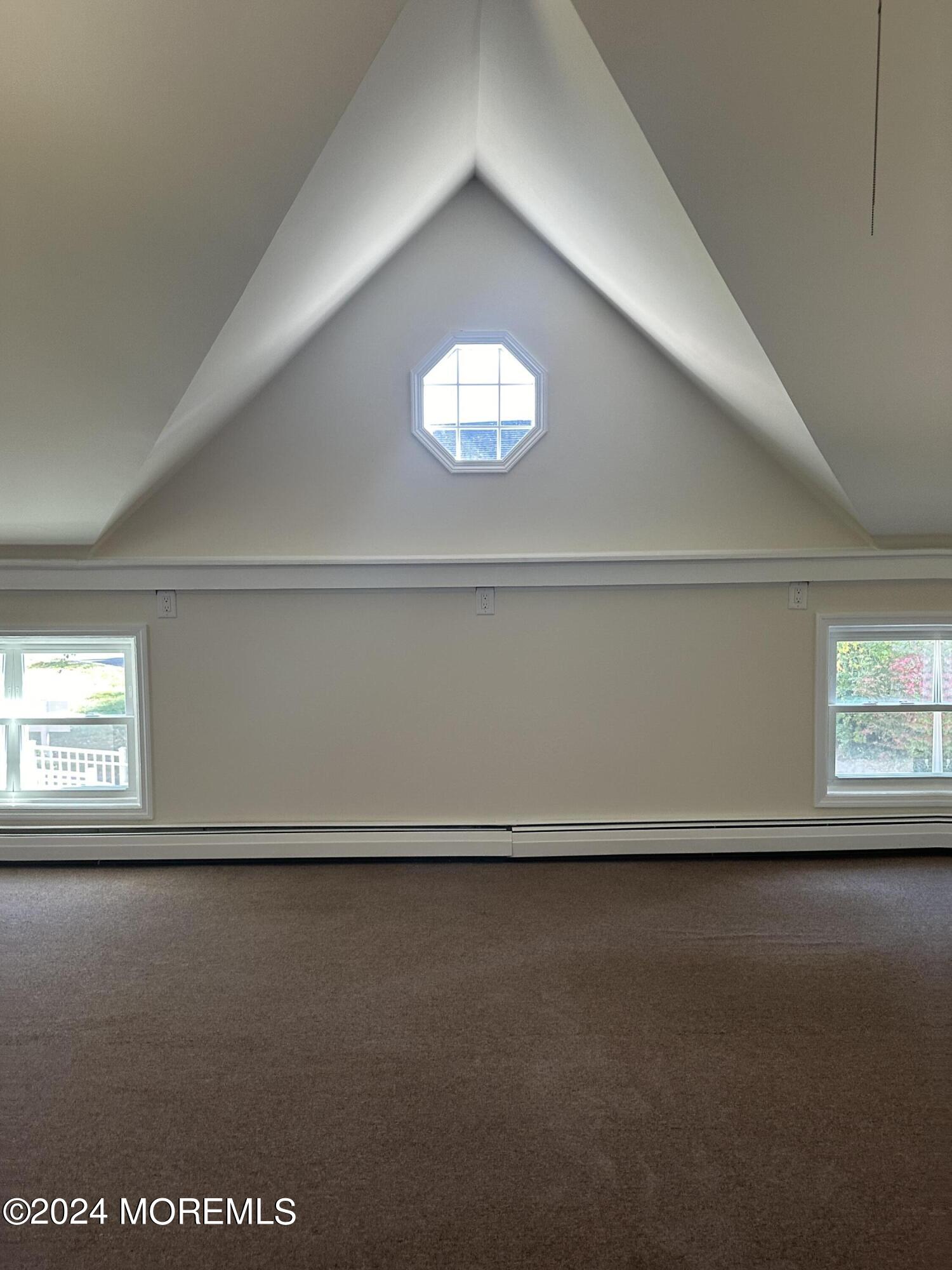 1 Leonardville Road, Unit C Middletown, NJ 07748 - Photo 3 of 12 a view of a big room with wooden floor and windows