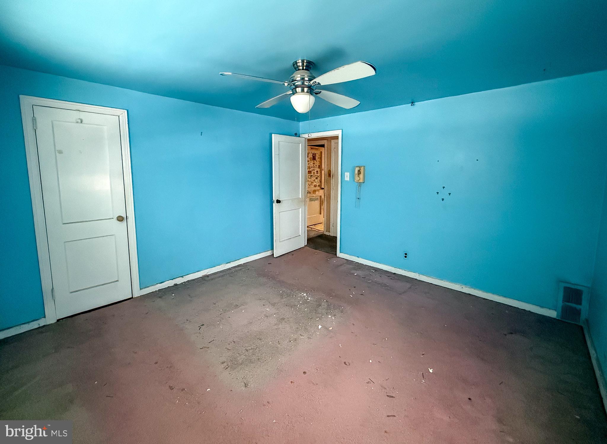 6333 Cottage Street Philadelphia, PA 19135 - Photo 13 of 23 a view of a livingroom with a ceiling fan and window