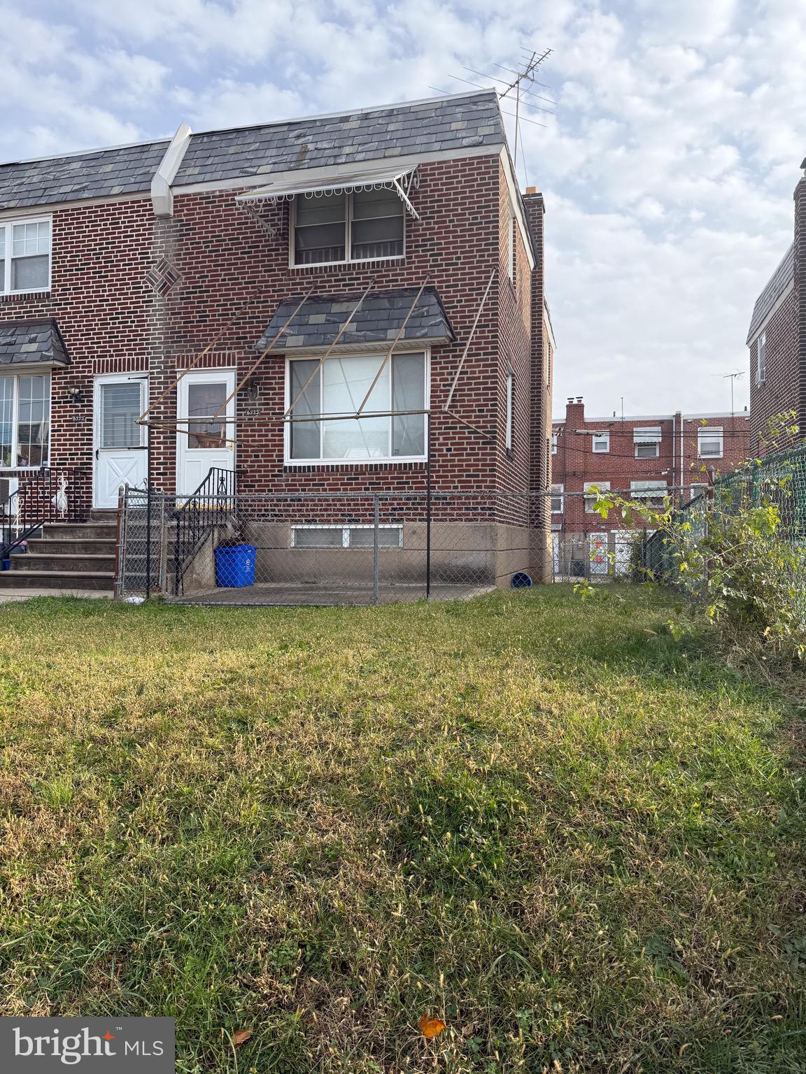 6333 Cottage Street Philadelphia, PA 19135 - Photo 2 of 23 a front view of house with yard