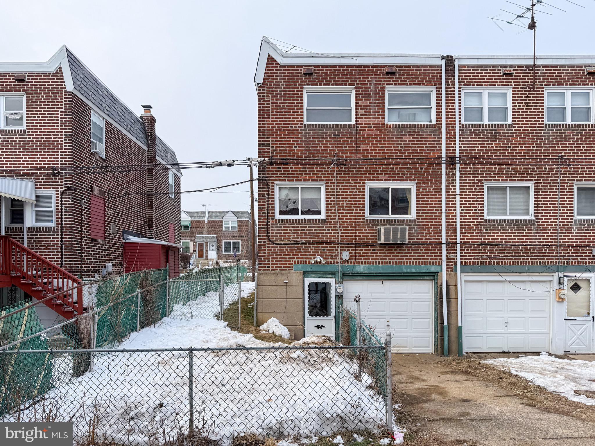 6333 Cottage Street Philadelphia, PA 19135 - Photo 22 of 23 a front view of a house with a yard