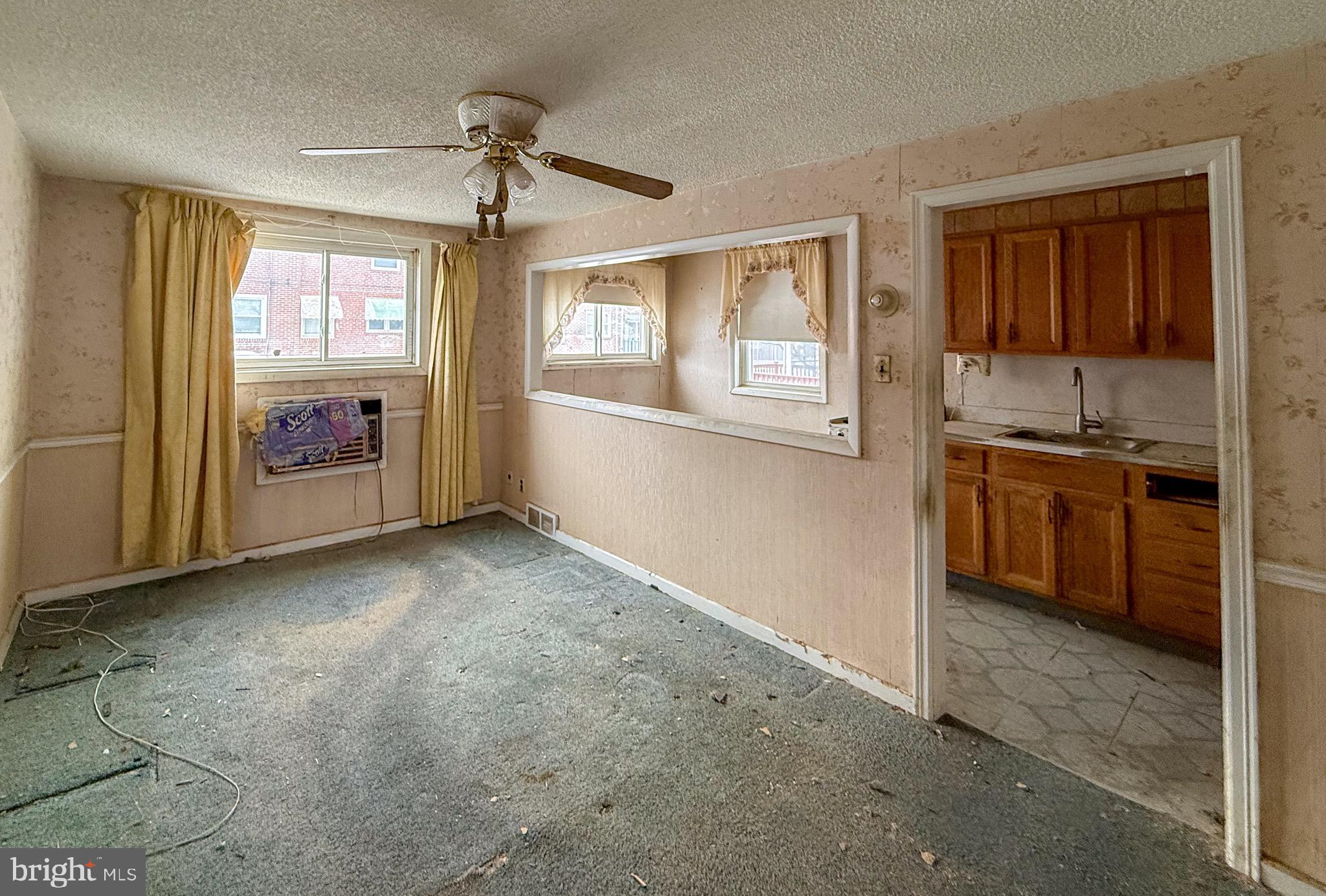 6333 Cottage Street Philadelphia, PA 19135 - Photo 8 of 23 a view of a kitchen with a sink and a window