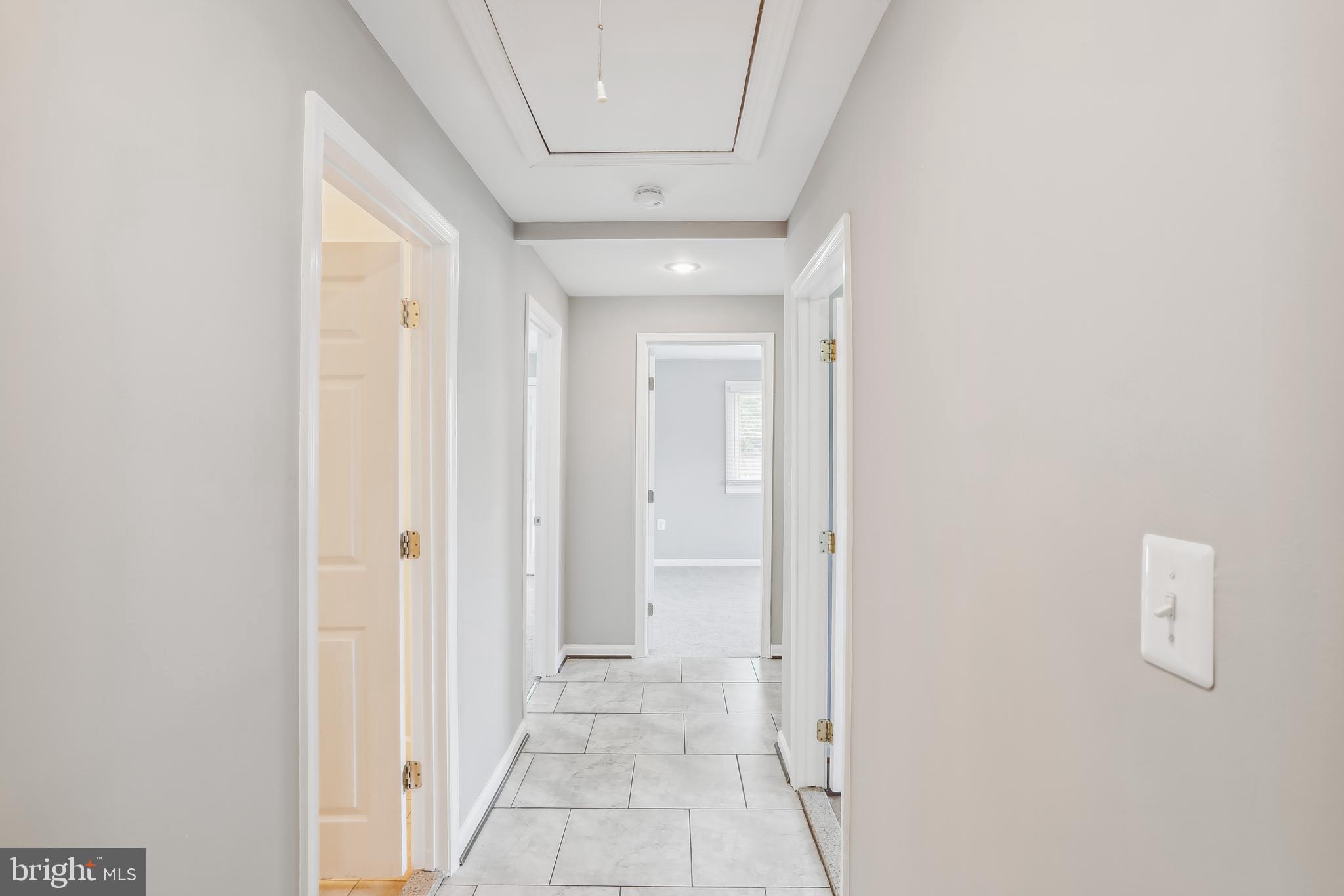 8 Sumac Road Glen Burnie, MD 21060 - Photo 24 of 31 Hallway leading to bedrooms & laundry