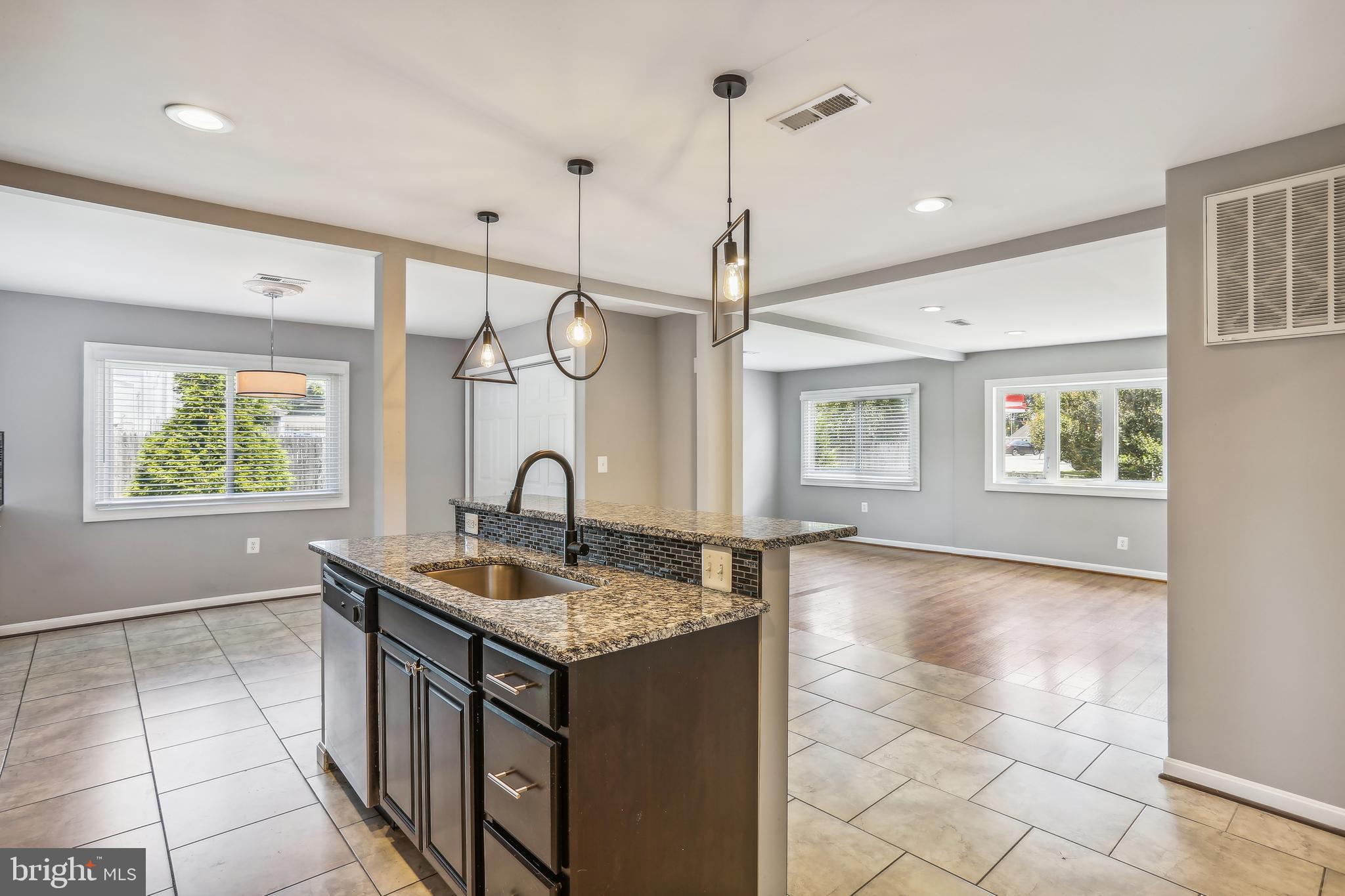 8 Sumac Road Glen Burnie, MD 21060 - Photo 3 of 31 Kitchen is open to living room