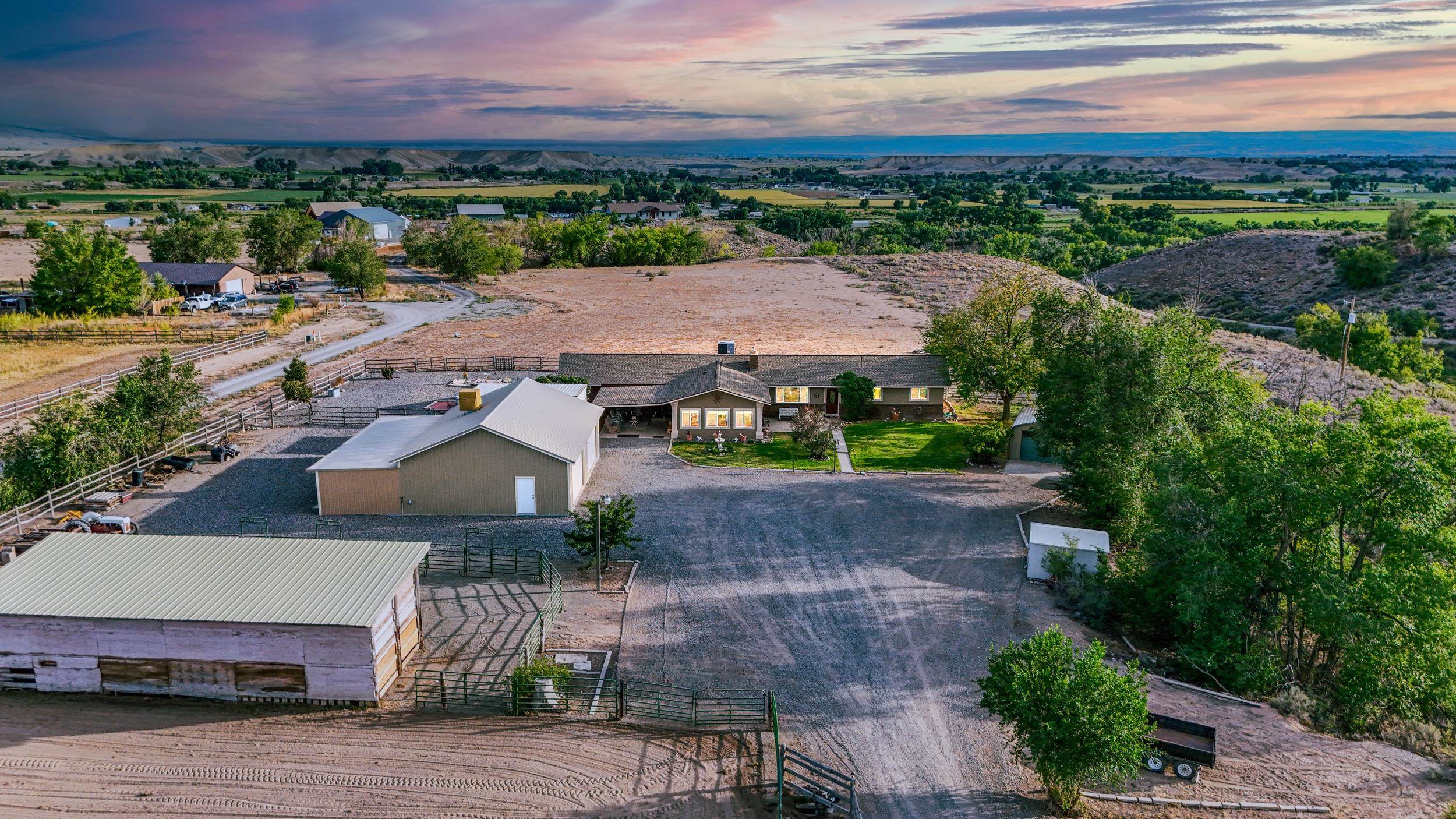 20786 Iris Road Austin, CO 81410 - Photo 4 of 38 an aerial view of a house with a garden