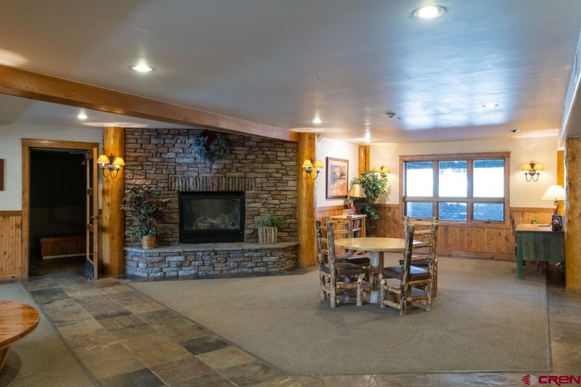 9 Hunter Hill Road, Unit 303 Crested Butte, CO 81225 - Photo 25 of 25 common area fireplace