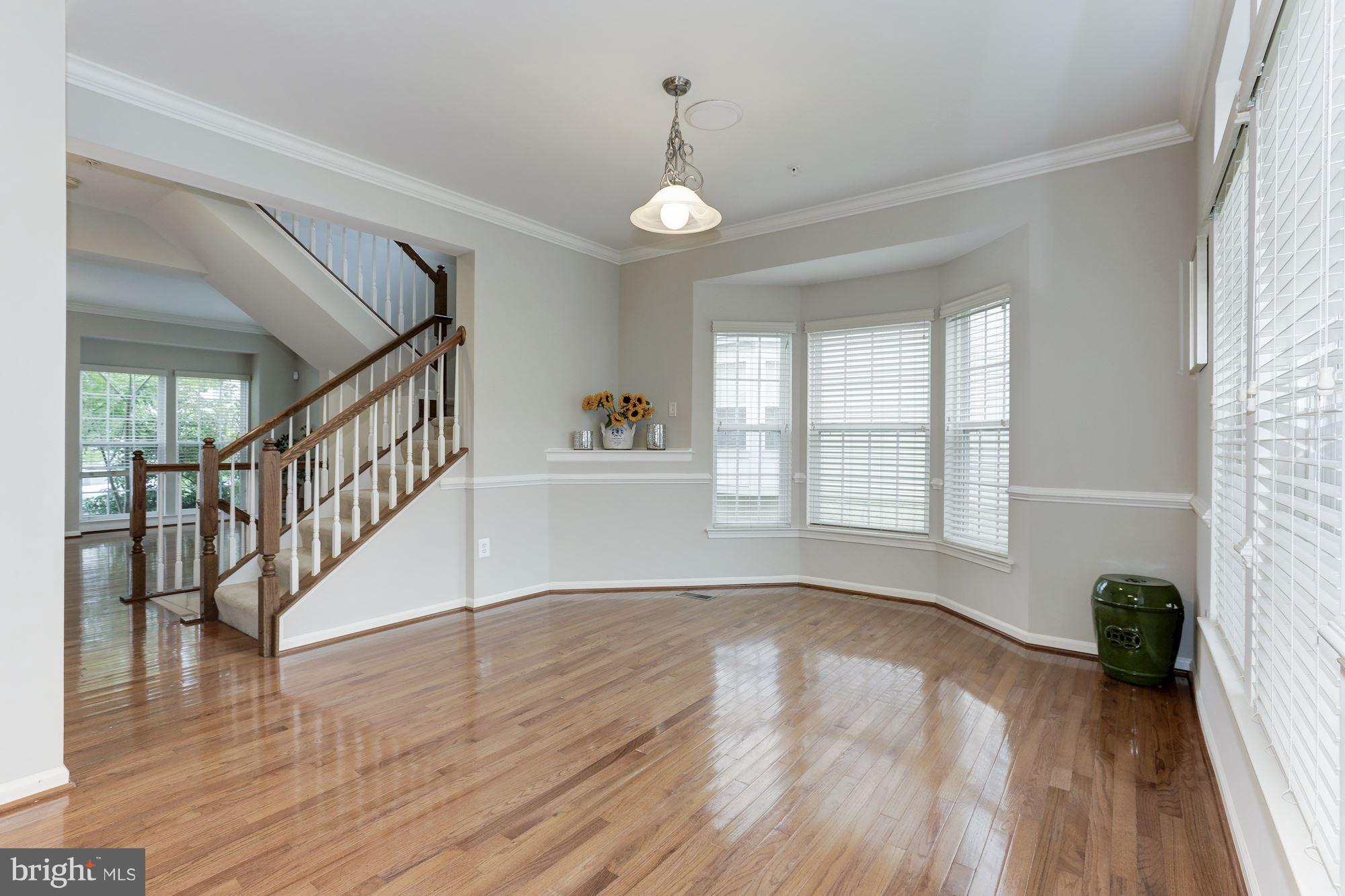 7522 Helston Court Hanover, MD 21076 - Photo 5 of 30 a view of an entryway with wooden floor