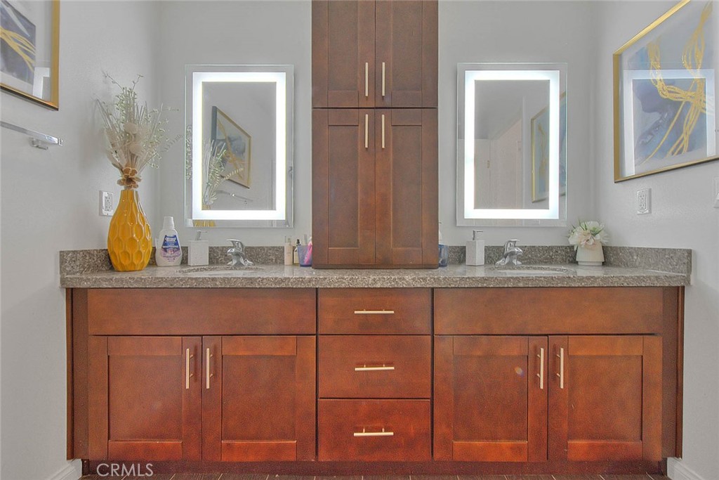 11 South 3rd Street, Unit 226 Alhambra, CA 91801 - Photo 19 of 25 a bathroom with a sink and a mirror