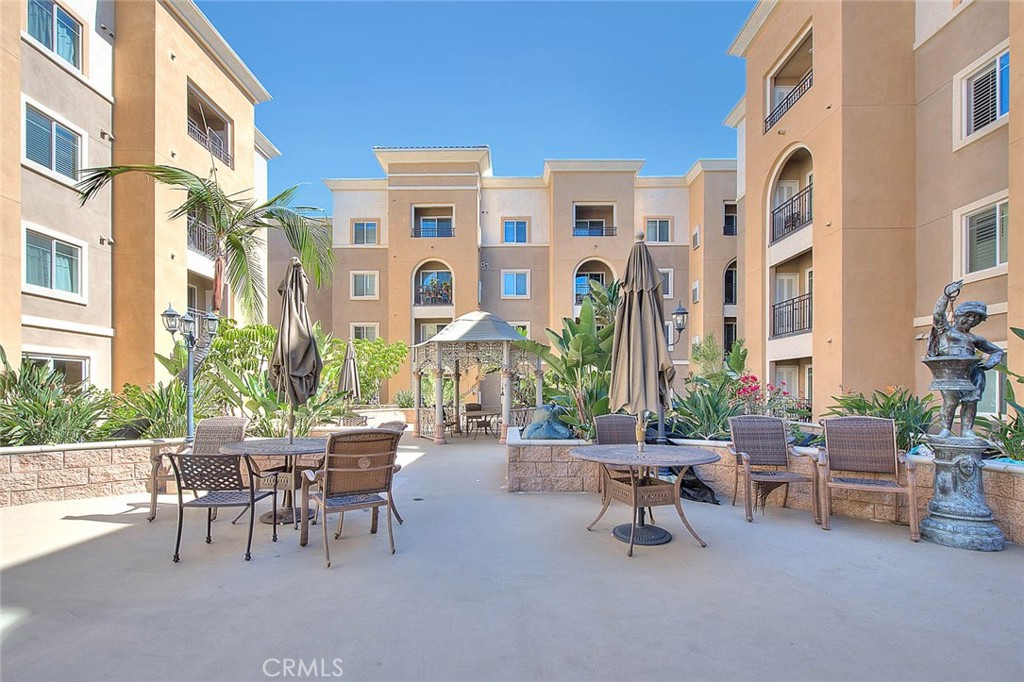 11 South 3rd Street, Unit 226 Alhambra, CA 91801 - Photo 6 of 25 a view of a building and chairs in a street