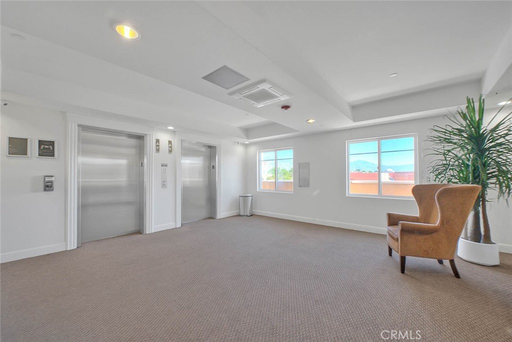 11 South 3rd Street, Unit 226 Alhambra, CA 91801 - Photo 10 of 25 a view of a livingroom with furniture and windows