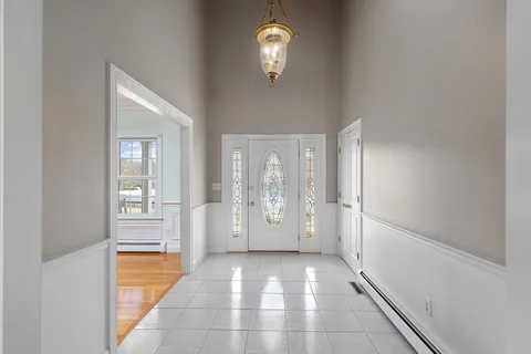 a view of a hallway with windows