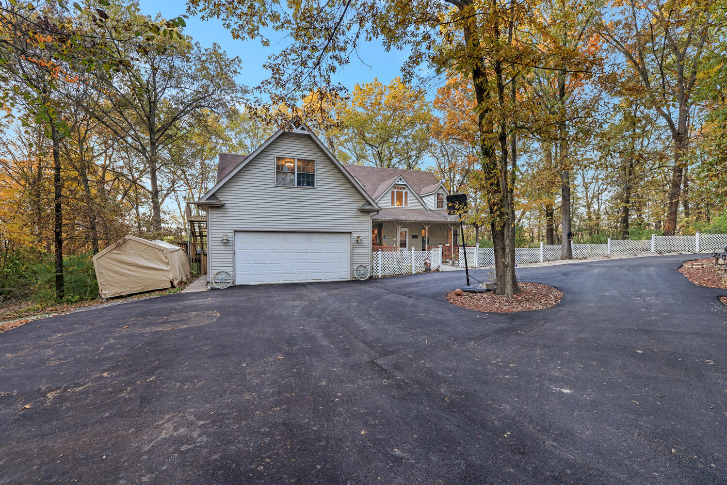 1 River Vly Rnch Road White Heath, IL 61884 - Photo 2 of 66 a house with trees in the background