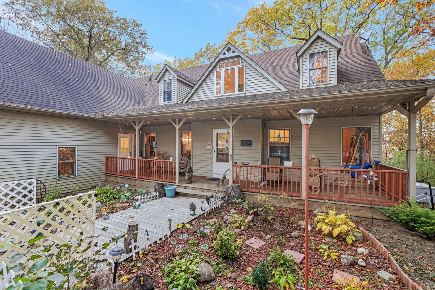 1 River Vly Rnch Road White Heath, IL 61884 - Photo 16 of 66 a front view of house with yard outdoor seating and barbeque oven