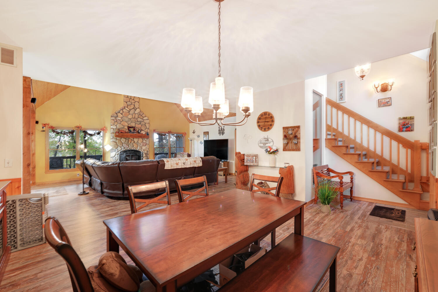 1 River Vly Rnch Road White Heath, IL 61884 - Photo 20 of 66 a living room with furniture a rug and a chandelier