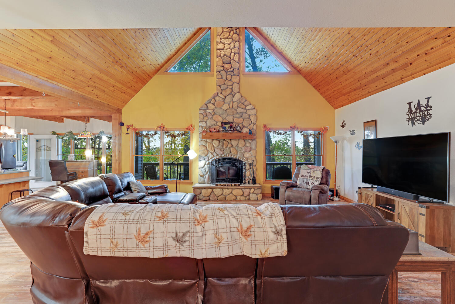 1 River Vly Rnch Road White Heath, IL 61884 - Photo 23 of 66 a living room with fireplace furniture and a flat screen tv