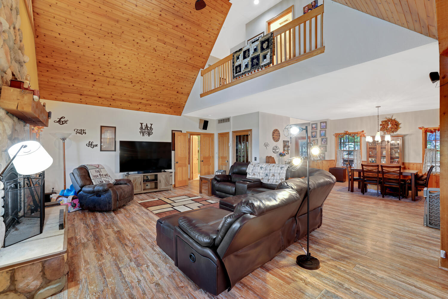 1 River Vly Rnch Road White Heath, IL 61884 - Photo 24 of 66 a living room with furniture and a flat screen tv