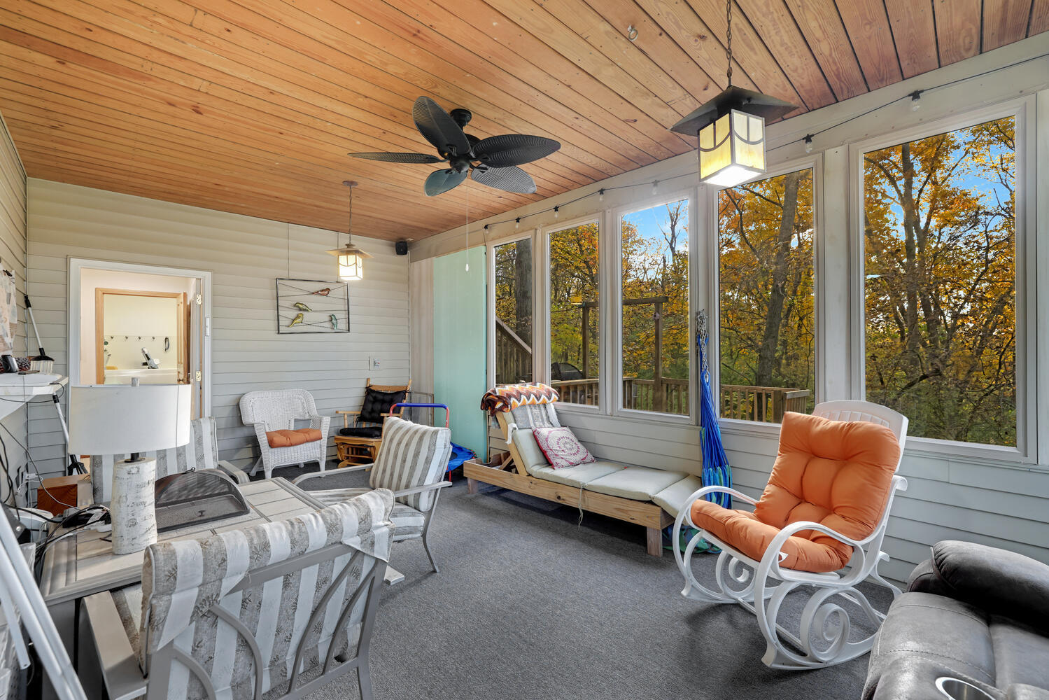 1 River Vly Rnch Road White Heath, IL 61884 - Photo 35 of 66 a living room with furniture a ceiling fan and a large window