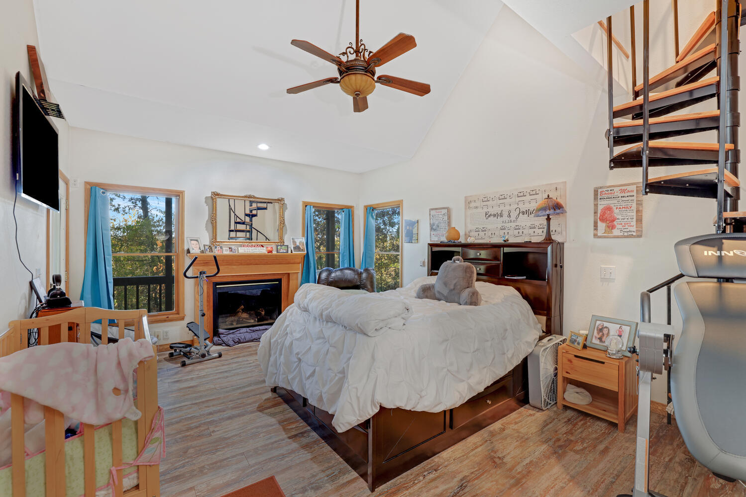 1 River Vly Rnch Road White Heath, IL 61884 - Photo 37 of 66 a living room with furniture a fireplace and a flat screen tv