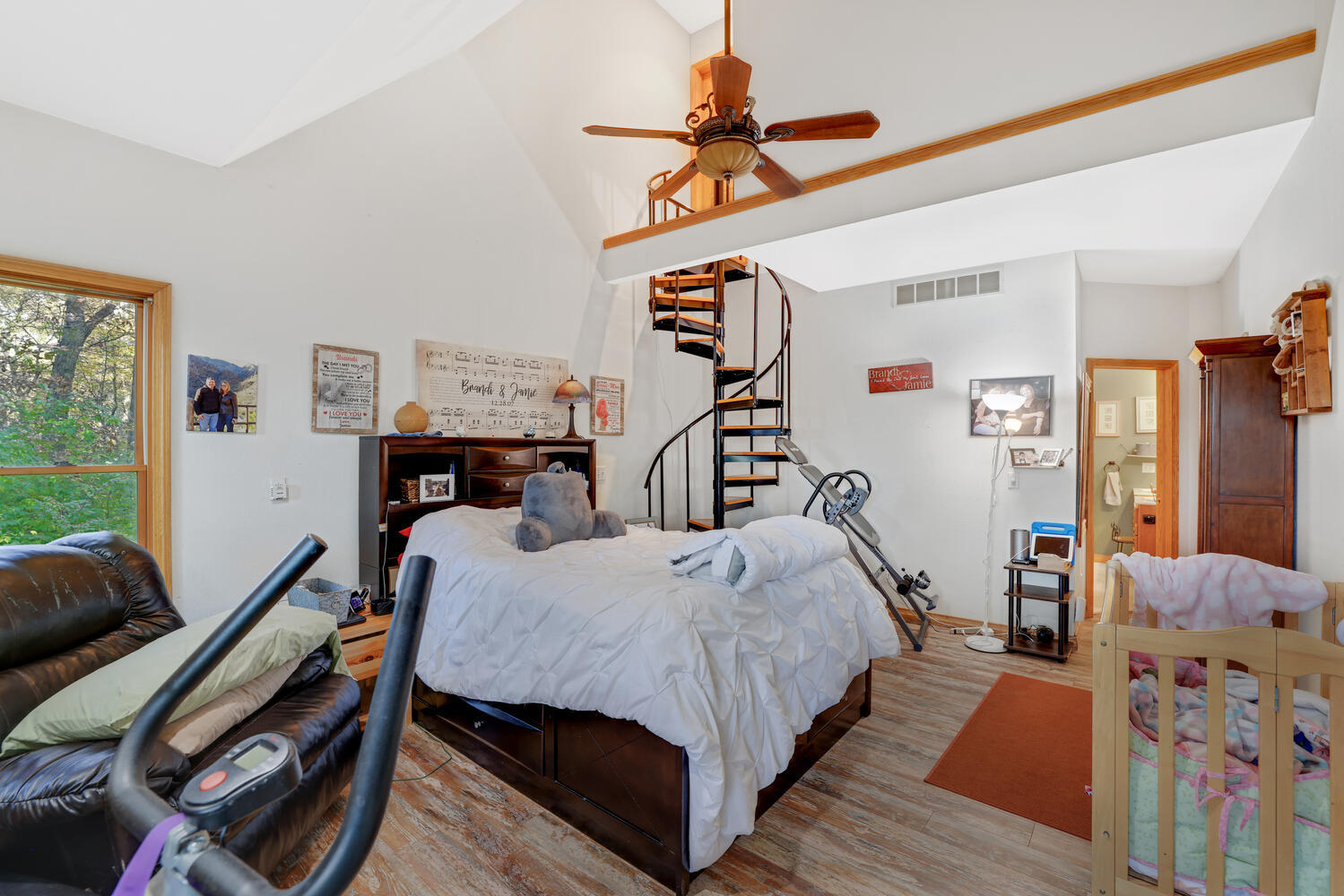 1 River Vly Rnch Road White Heath, IL 61884 - Photo 38 of 66 a bed room with a bed and a chandelier