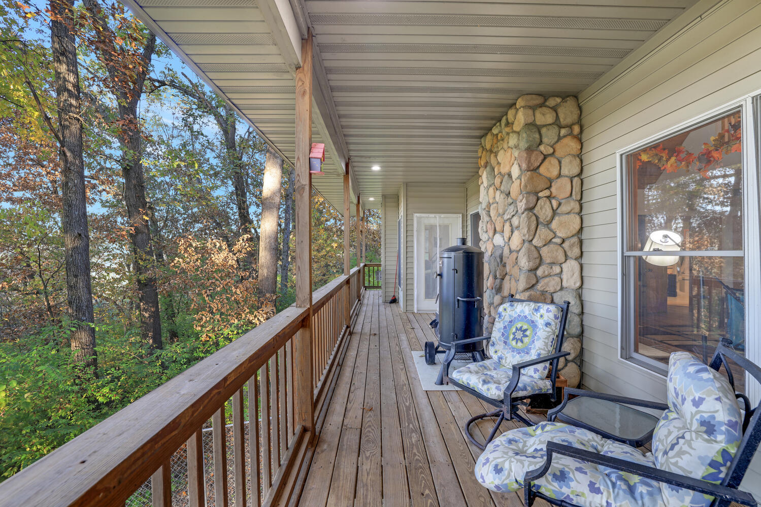 1 River Vly Rnch Road White Heath, IL 61884 - Photo 41 of 66 a view of a balcony with wooden floor and furniture