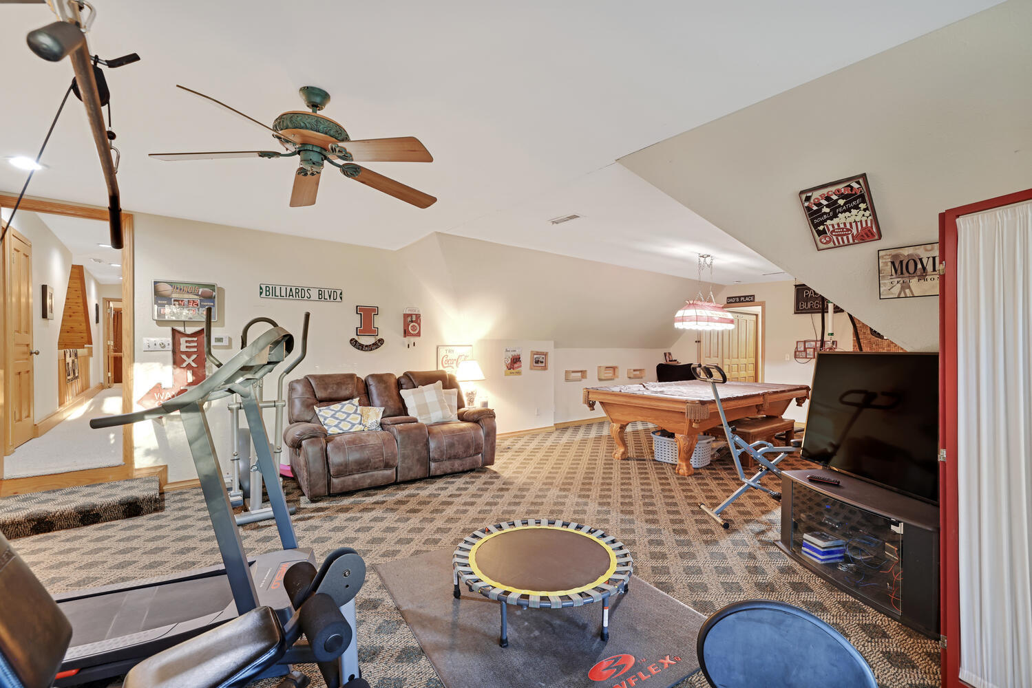 1 River Vly Rnch Road White Heath, IL 61884 - Photo 55 of 66 a living room with furniture a rug and a flat screen tv