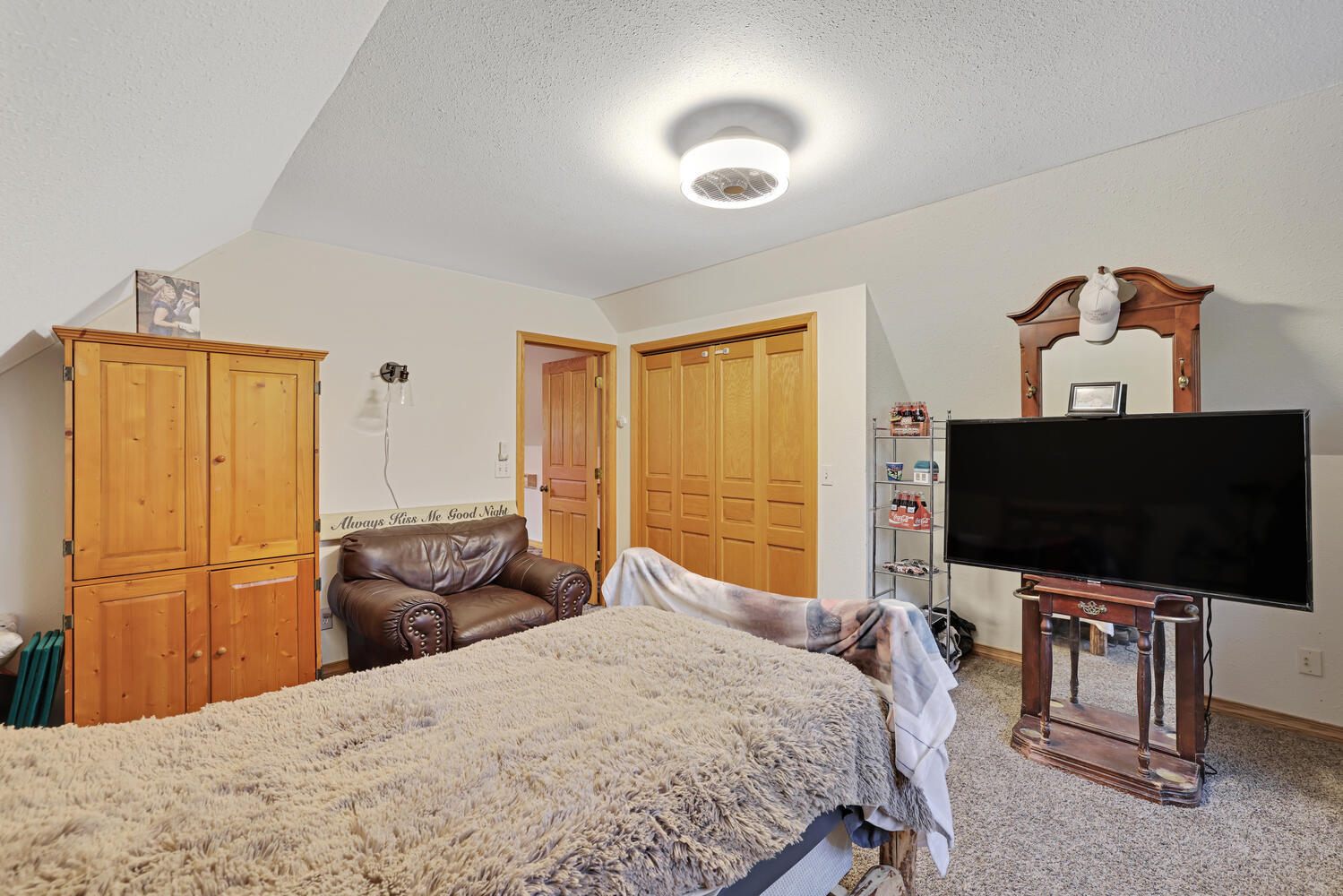 1 River Vly Rnch Road White Heath, IL 61884 - Photo 58 of 66 a bedroom with a bed and a flat screen tv