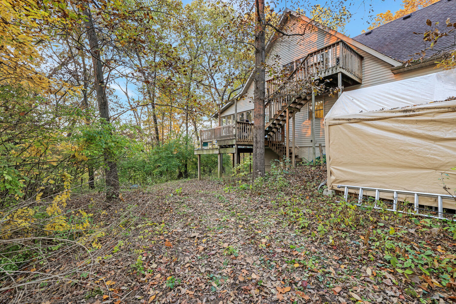 1 River Vly Rnch Road White Heath, IL 61884 - Photo 8 of 66 a backyard of a house with table and chairs