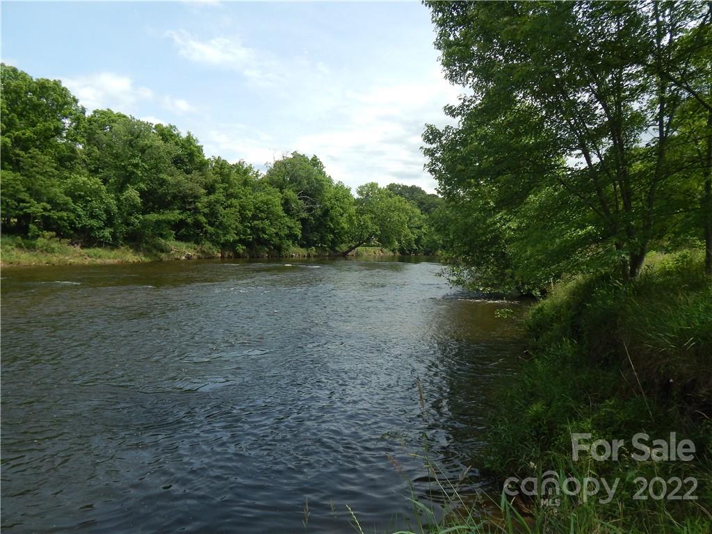 0 Cronin Road Waynesville, NC 28785 - Photo 1 of 21 a view of a lake with a yard