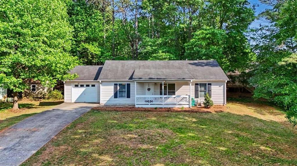 94 Villa Rosa Way Temple, GA 30179 - Photo 2 of 34 front view of a house with a yard