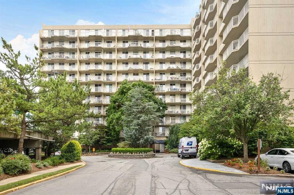 1055 River Road, Unit 905 Edgewater, NJ 07020 - Photo 15 of 26 front view of a building