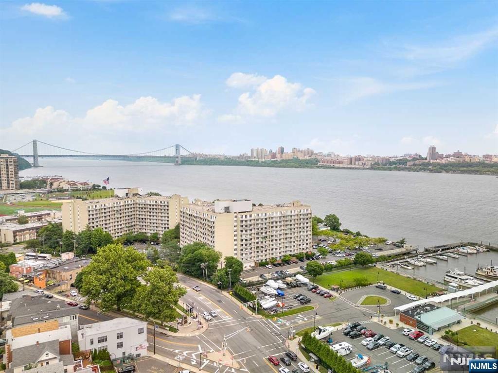 1055 River Road, Unit 905 Edgewater, NJ 07020 - Photo 18 of 26 a picture of a city view and lake view