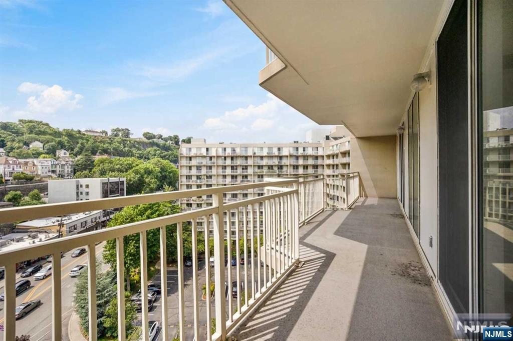 1055 River Road, Unit 905 Edgewater, NJ 07020 - Photo 7 of 26 a view of a balcony with city view