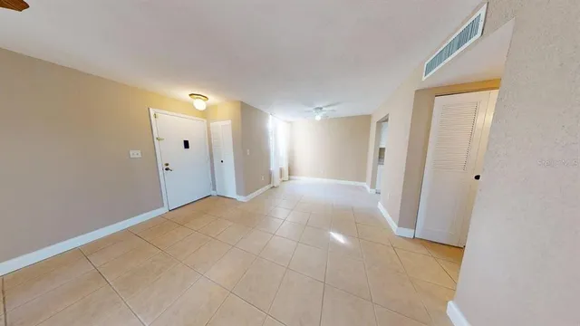 a view of a livingroom with a staircase