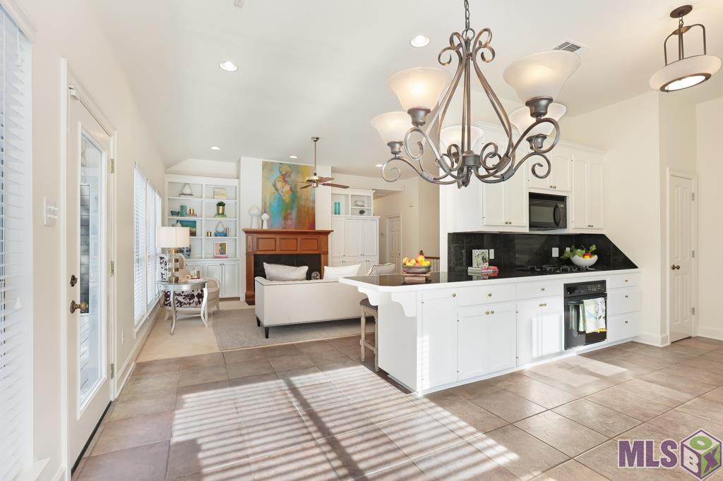 12316 Perkins Road Baton Rouge, LA 70810 - Photo 13 of 36 eat in kitchen area and bar