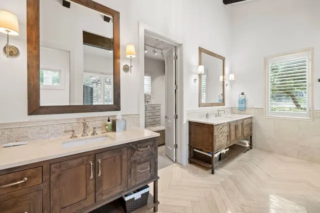 a bedroom with a bed couch and window