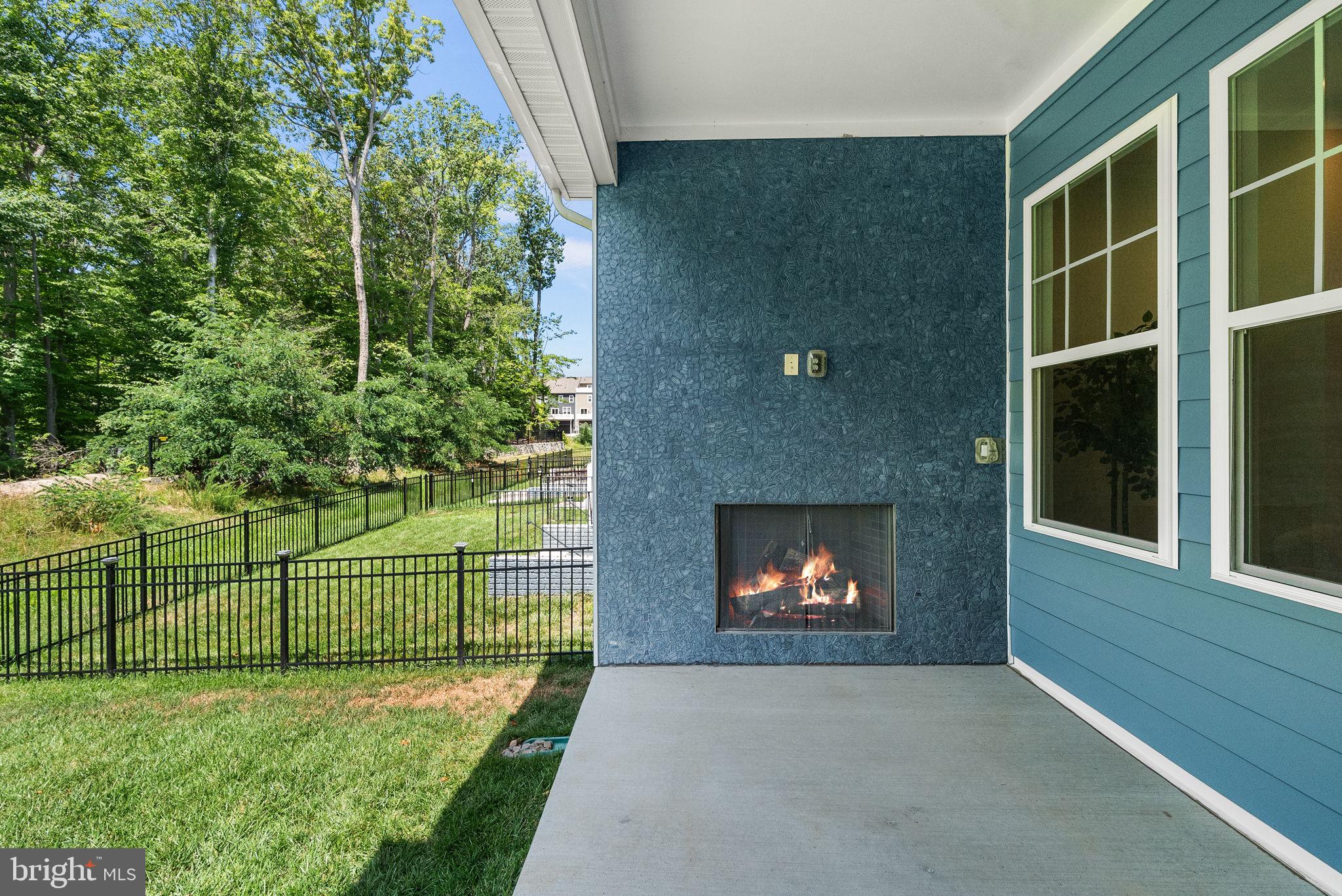 18120 Moss Garden Road Dumfries, VA 22026 - Photo 36 of 54 Rear Patio with Fireplace