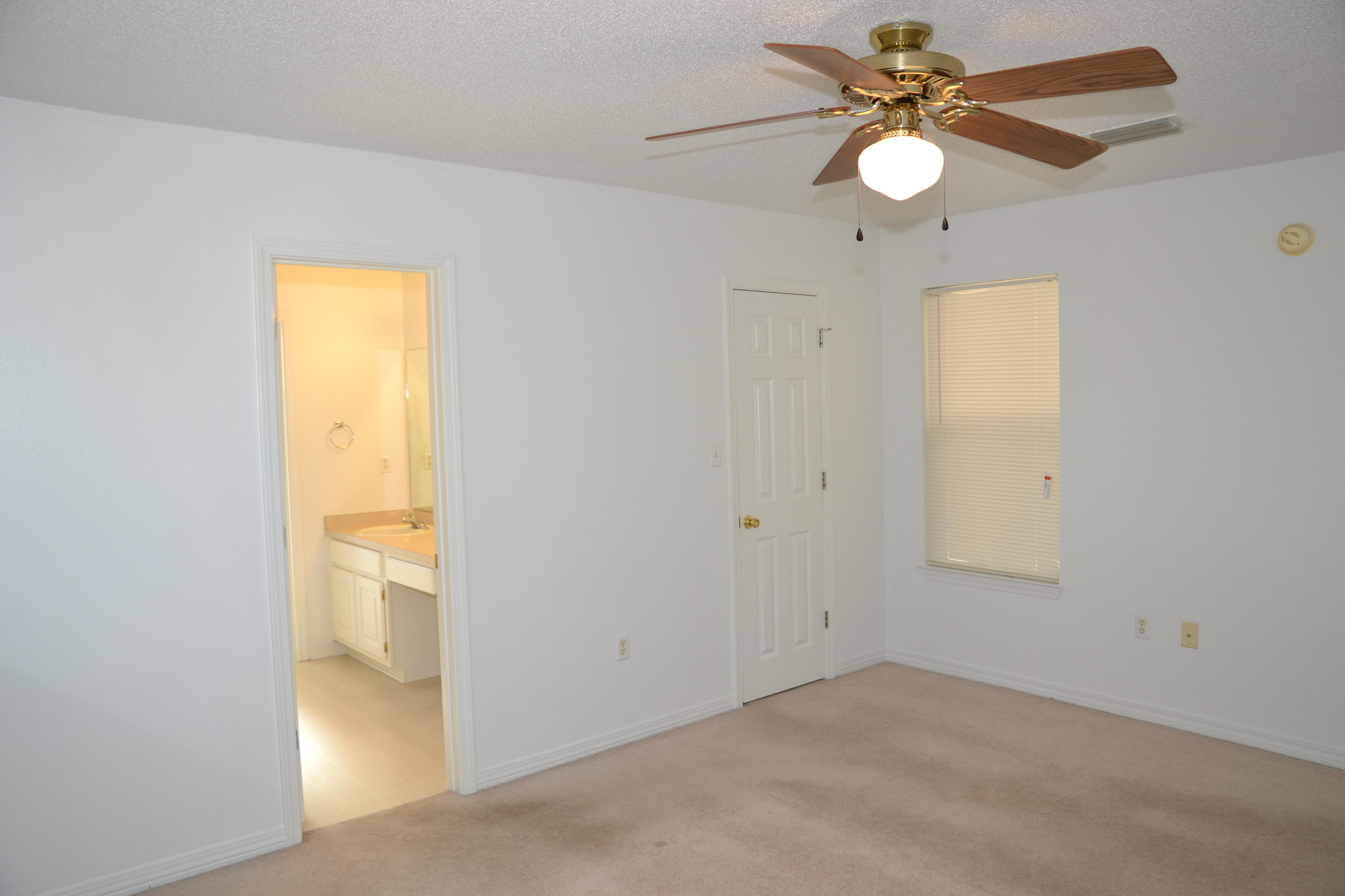 729 Riva Ridge Drive Crestview, FL 32539 - Photo 15 of 40 an empty room with a window and a fan