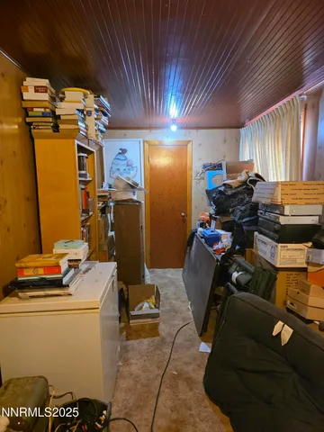 a room with furniture and gym equipment