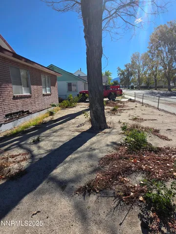 a view of a yard with an outdoor space
