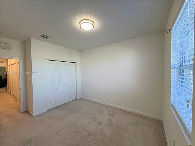 an empty room with closet