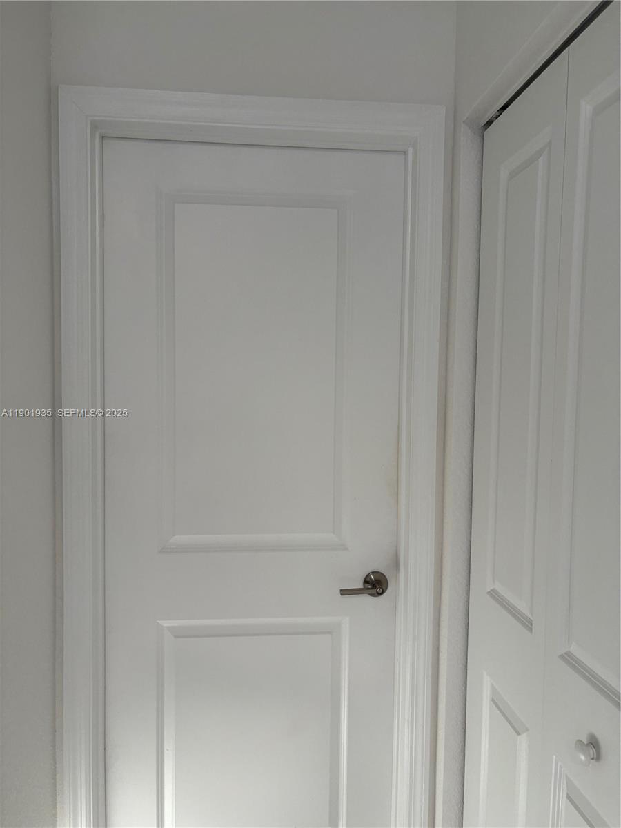 1020 Southeast 26th Street Homestead, FL 33035 - Photo 23 of 47 a close view of closet