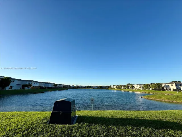 a view of a lake from a yard