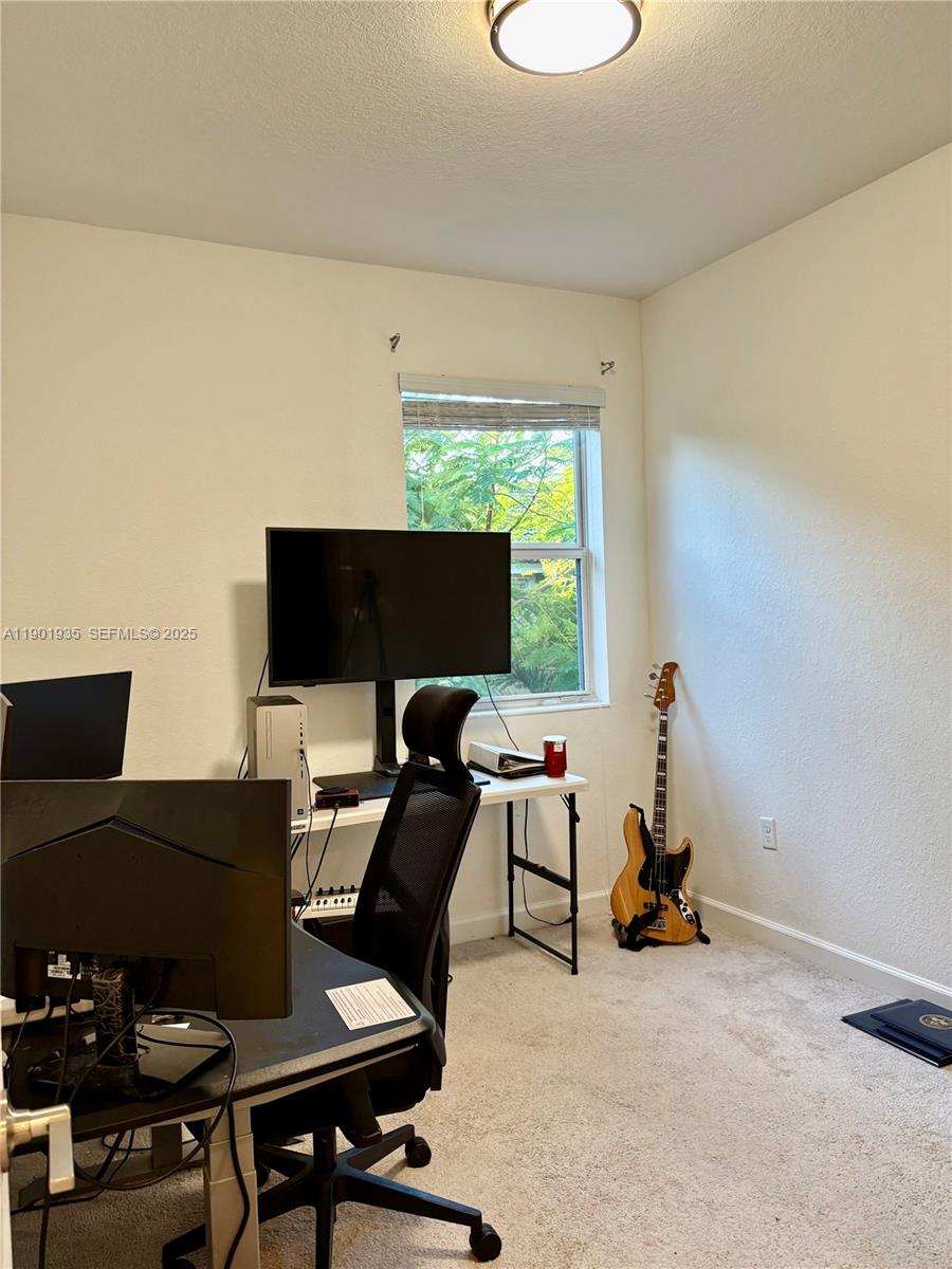 1020 Southeast 26th Street Homestead, FL 33035 - Photo 38 of 47 a view of a workspace with a window