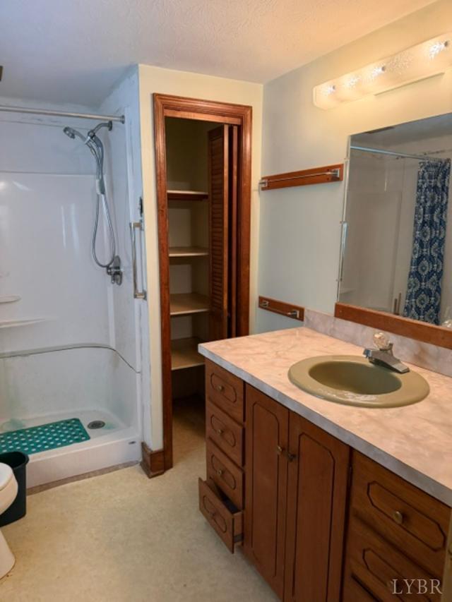439 Midgett Farm Road Concord, VA 24538 - Photo 18 of 27 a bathroom with a sink and a mirror