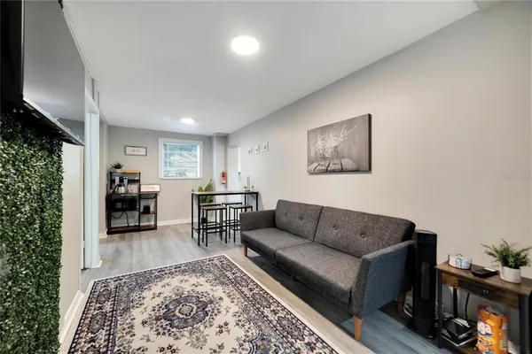 a living room with furniture and a couch