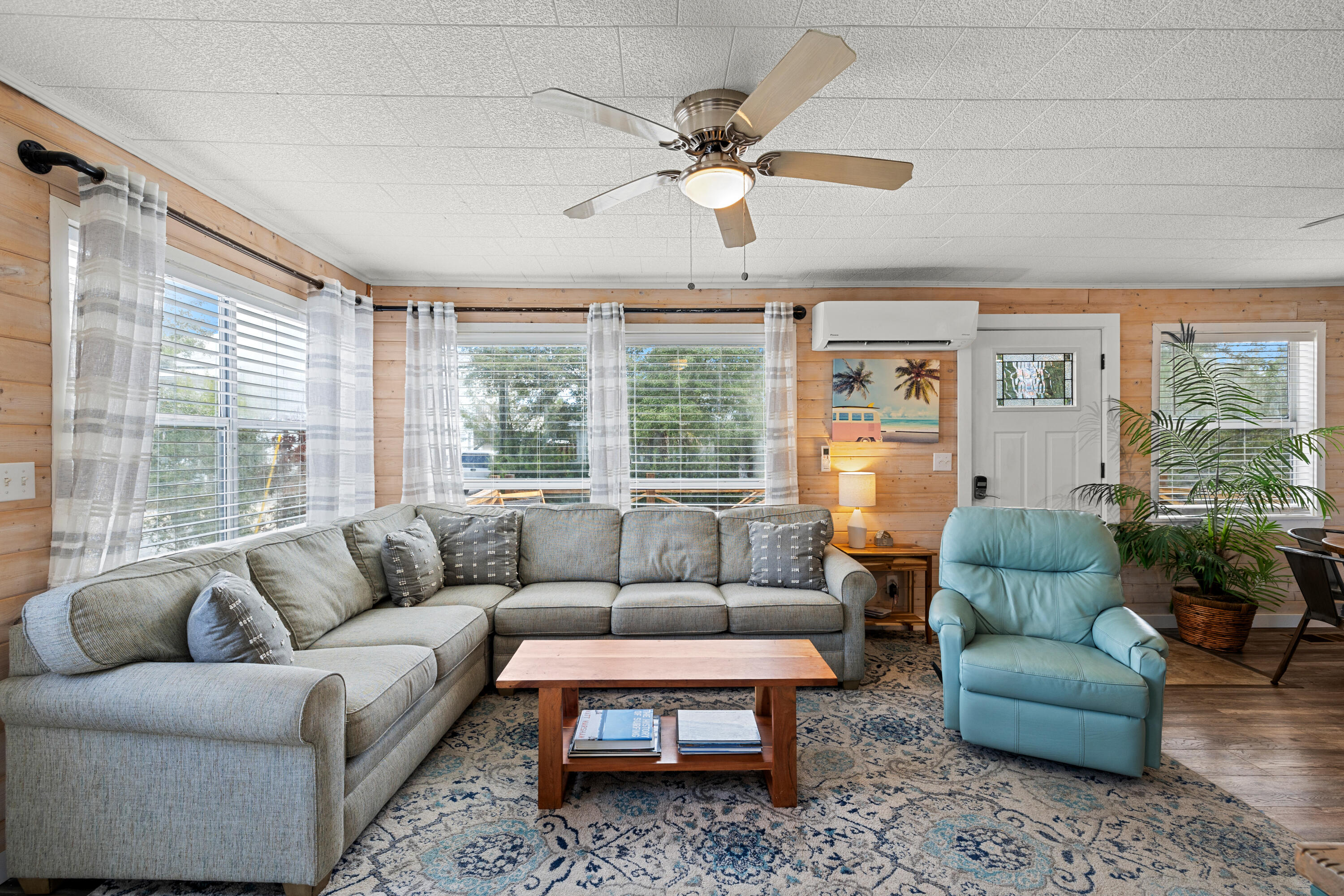 279 Robert Ellis Street Santa Rosa Beach, FL 32459 - Photo 2 of 29 a living room with furniture and a large window