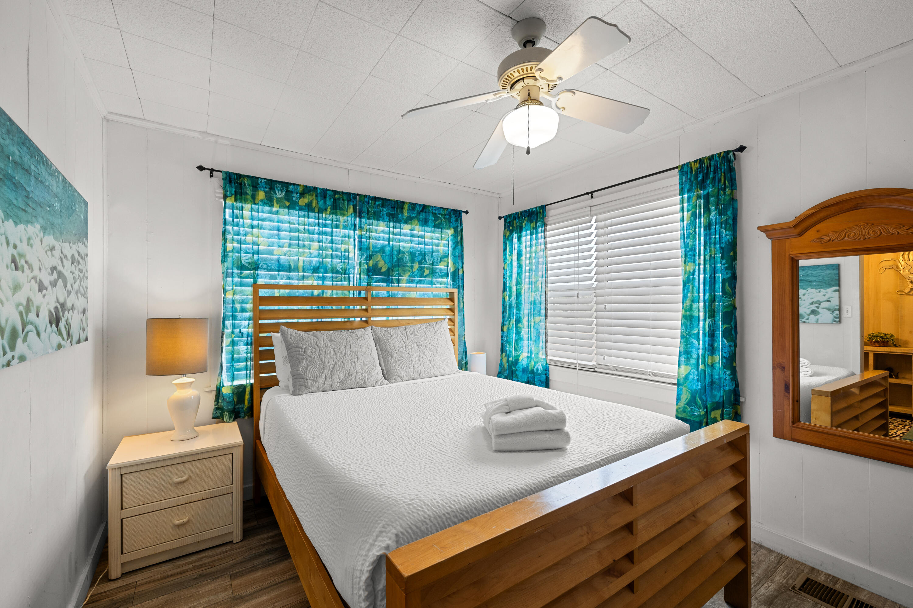 279 Robert Ellis Street Santa Rosa Beach, FL 32459 - Photo 7 of 29 a bedroom with a bed and a large window with table