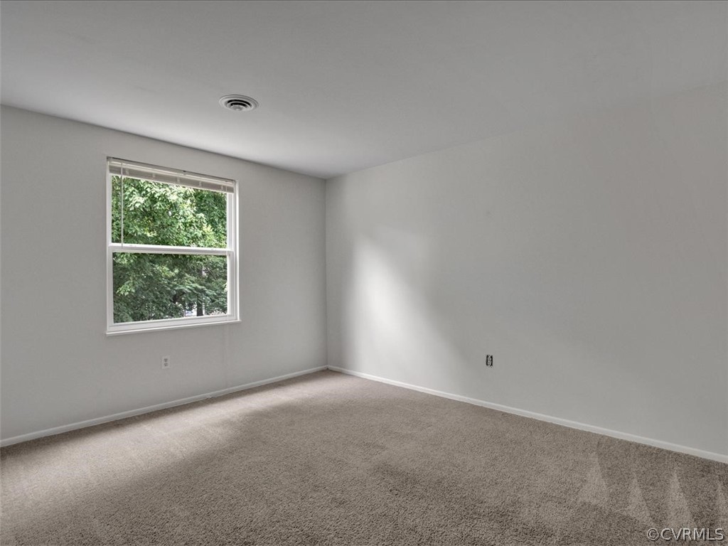 4131 Woodfield Road North Chesterfield, VA 23234 - Photo 13 of 20 an empty room with windows