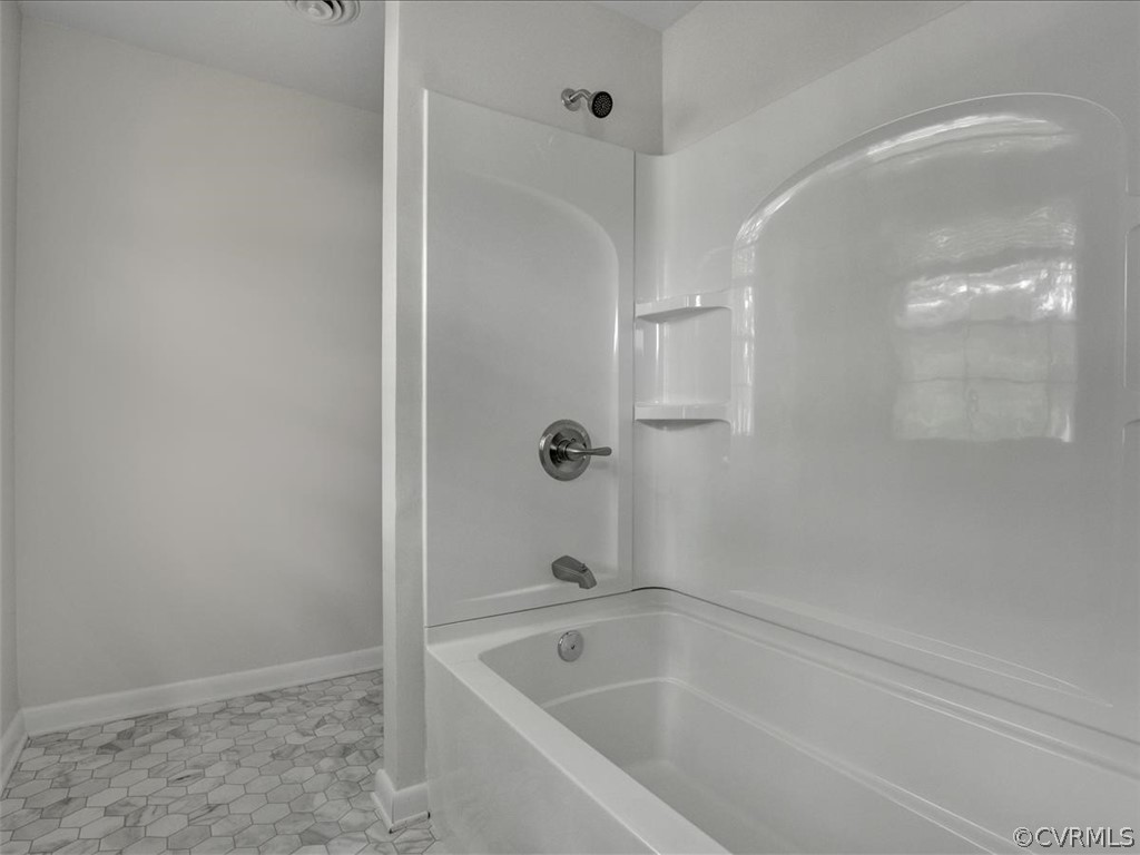 4131 Woodfield Road North Chesterfield, VA 23234 - Photo 14 of 20 a white bath tub sitting next to a shower