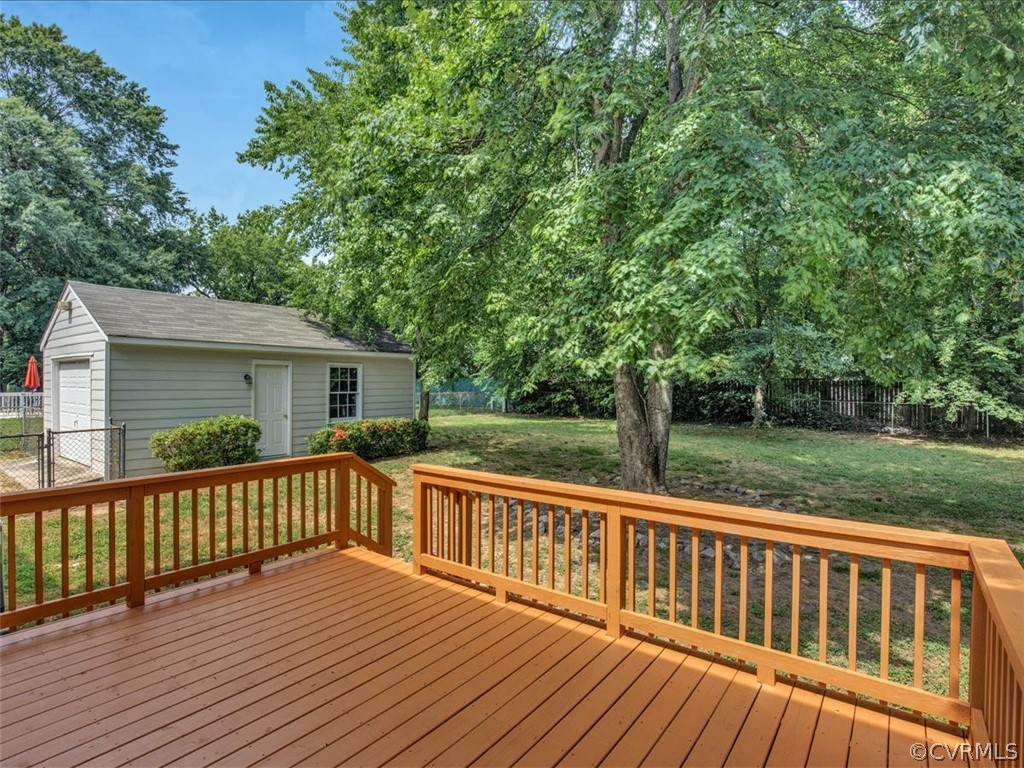 4131 Woodfield Road North Chesterfield, VA 23234 - Photo 18 of 20 a view of a wooden deck with a yard