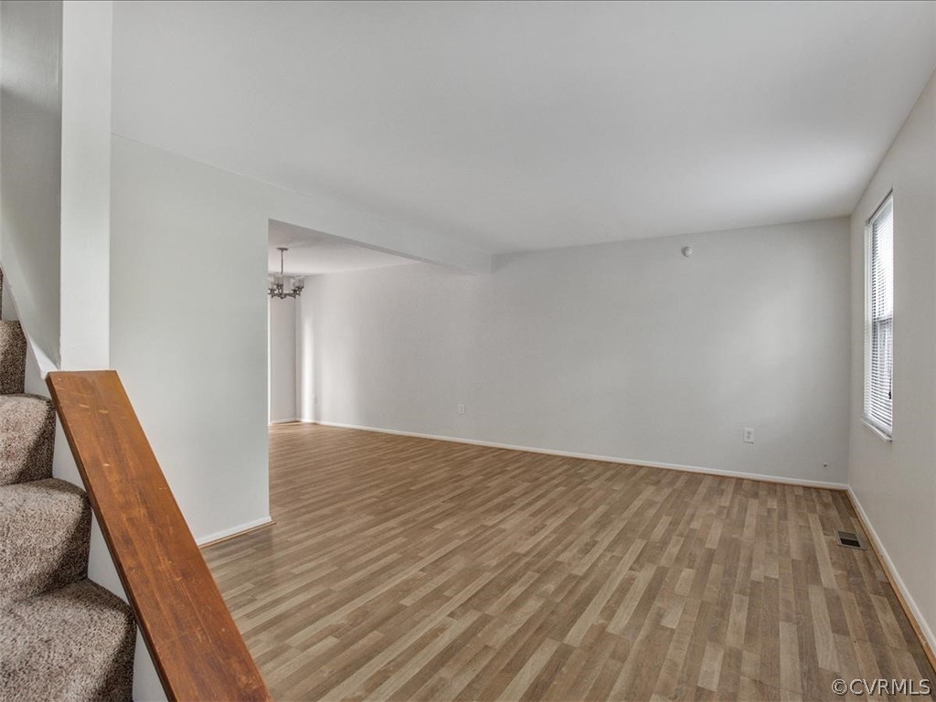 4131 Woodfield Road North Chesterfield, VA 23234 - Photo 5 of 20 wooden floor in an empty room with a window